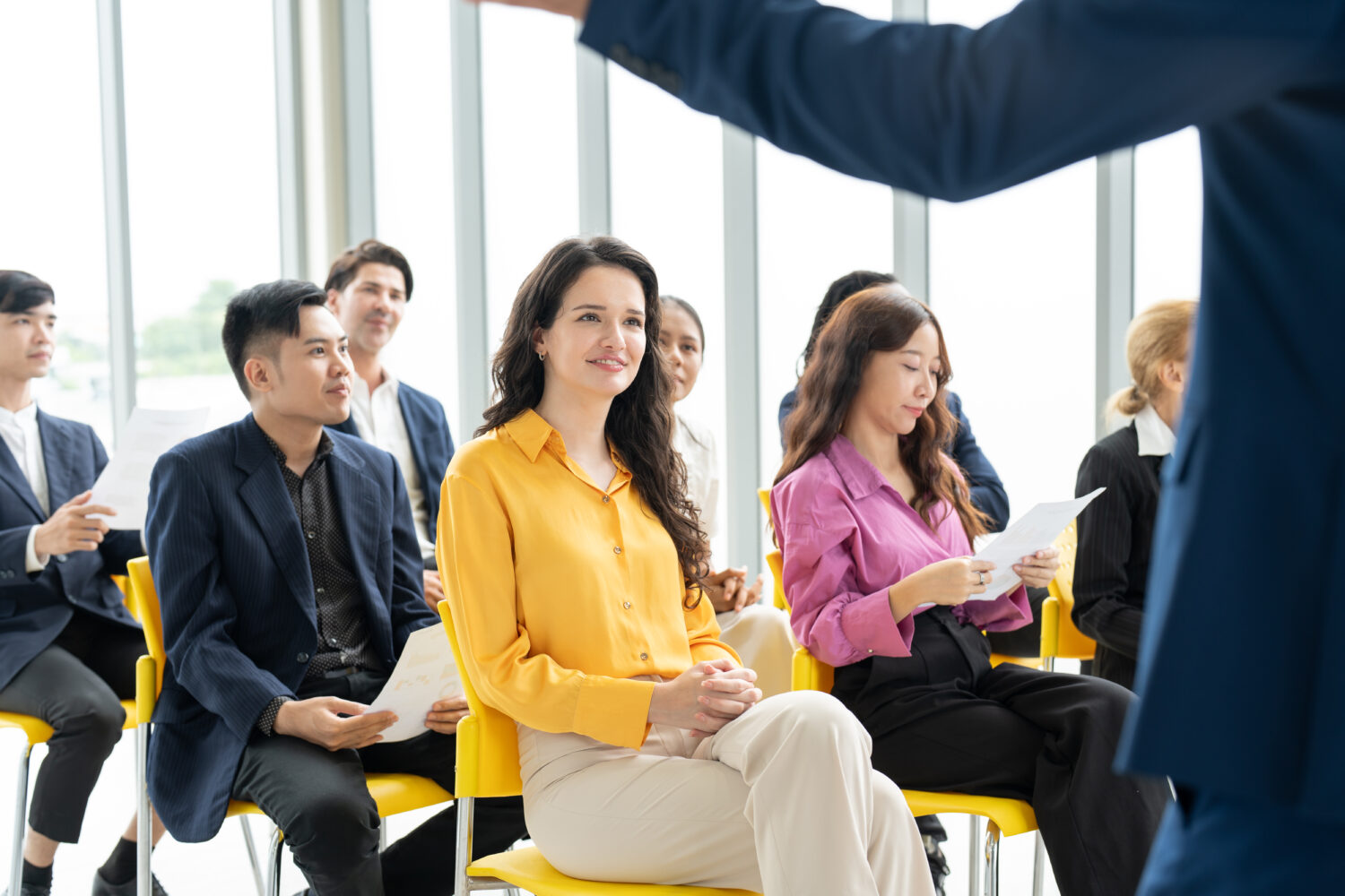 Executives engaged in an interactive corporate training session focused on high performance at Training Edge International in Singapore