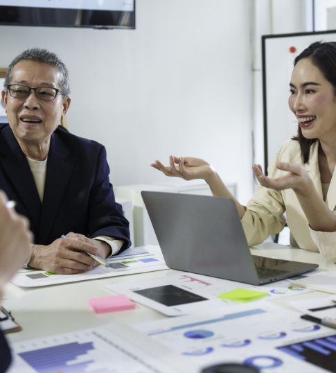 Business team participating in interactive workshop at a corporate training centre in Singapore
